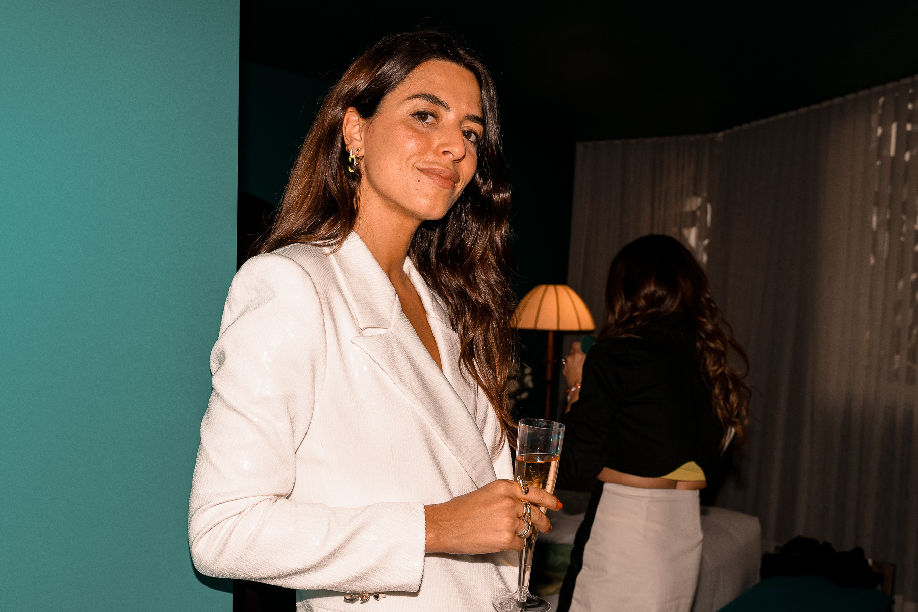 Woman dressing suit in sequin during miami fashion week